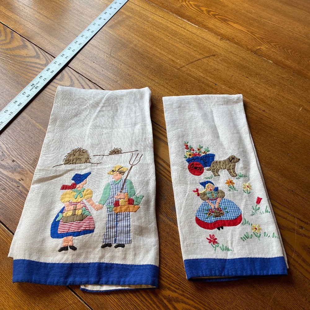Antique tea towels with farm family